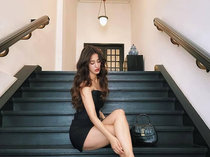 Disha Patani flaunts her flawlessly toned body while wearing an all-black Versace outfit.