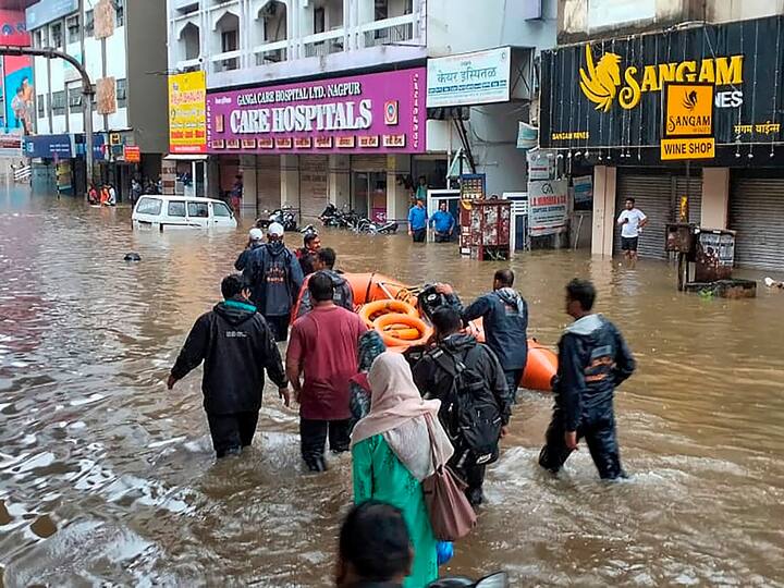 Heavy rain in Nagpur caused massive waterlogging and inundated several low-lying areas, throwing normal life out of gear. (Image Source: PTI)
