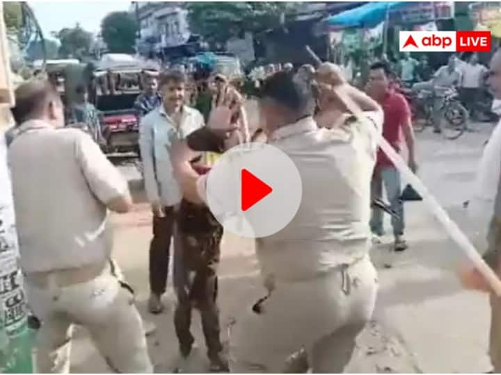 UP Police two policemen were seen brutally beating a disabled person In Siddharthnagar Uttar Pradesh News Watch: सिद्धार्थनगर में दिखा पुलिस का अमानवीय चेहरा, दिव्यांग शख्स को जमकर पीटते नजर आए दो पुलिसकर्मी