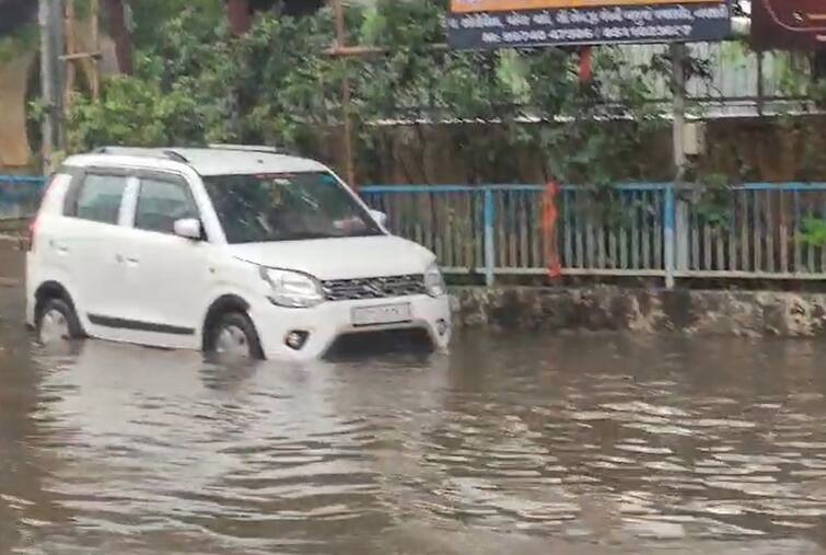 Due to heavy rains in Navsari roads of the city were waterlogged Ganesha mandals are worried નવસારીમાં ભારે વરસાદથી શહેરના માર્ગો થયા પાણી-પાણી, ગણેશ મંડળોની વધી ચિંતા