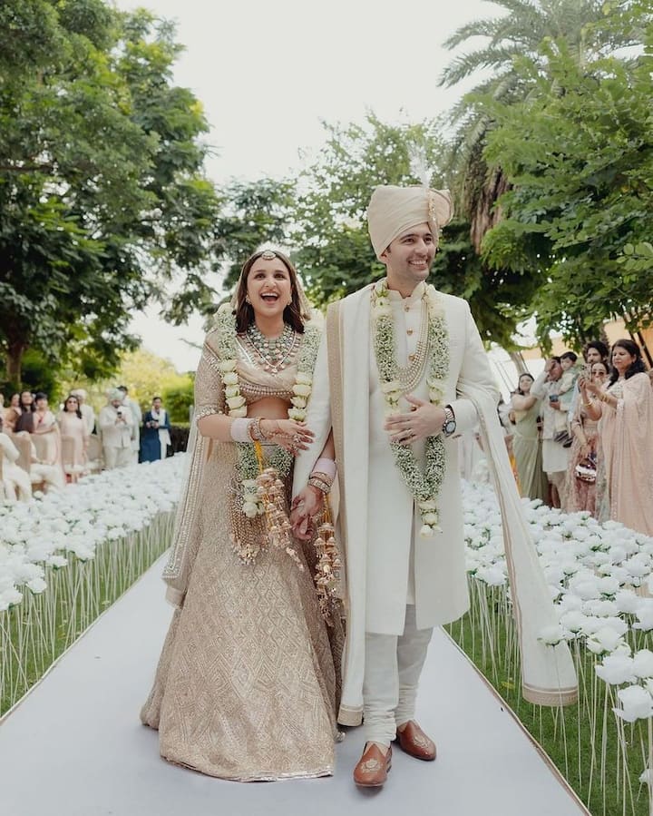 Parineeti Chopra and Raghav Chadha took to their social media handles to share their dreamy wedding pictures. The bride looked gorgeous in an ivory Manish Malhotra lehenga while the groom wore an ivory sherwani by his designer uncle Pawan Sachdeva.