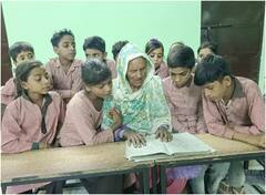 बुलंदशहर में पोते-पोतियों संग पढ़ना सीख रही 92 साल की दादी, समाज के लिए बनी प्रेरणा