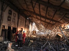 Charred Bodies And Metal: Aftermath Of Iraq Wedding Hall Fire That Killed Over 100 — IN PICS