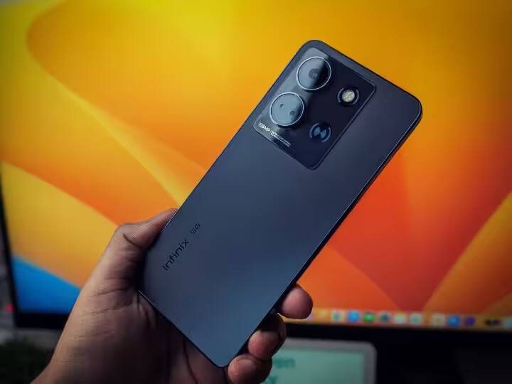 Infinix Note 30 5G : इंफिनिक्स के इस फोन में 6.78 इंच की LCD डिस्प्ले दी है, जिसमें 120HZ का रिफ्रेश रेट मिलता है. ये फोन मीडियाटेक डाइमेसिटी 6080 चिपसेट के साथ आता है, जो 4GB रैम और 128GB की स्टोरेज के साथ पेयर की गई है. कैमरा की बात करें तो इसमें 108 MP + 2 MP + 0.08 MP का ट्रिपल कैमरा सेटअप और 16MP का फ्रंट कैमरा दिया गया है. इस फोन को आप केवल 13,499 रुपये में खरीद सकते हैं.