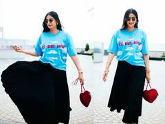 Sonam Kapoor Vibrantly Dresses Up In A Blue Tees And Black Skirt