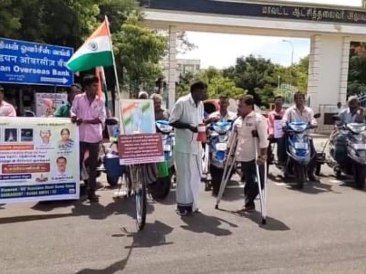 differently-abled Sangha welcomed Gandhian Karupiya in Karur TNN சைக்கிளுடன் தேச பக்தி பாதயாத்திரை செல்லும் காந்தியவாதி; கரூரில் மாற்றுத் திறனாளி சங்கத்தினர் வரவேற்பு