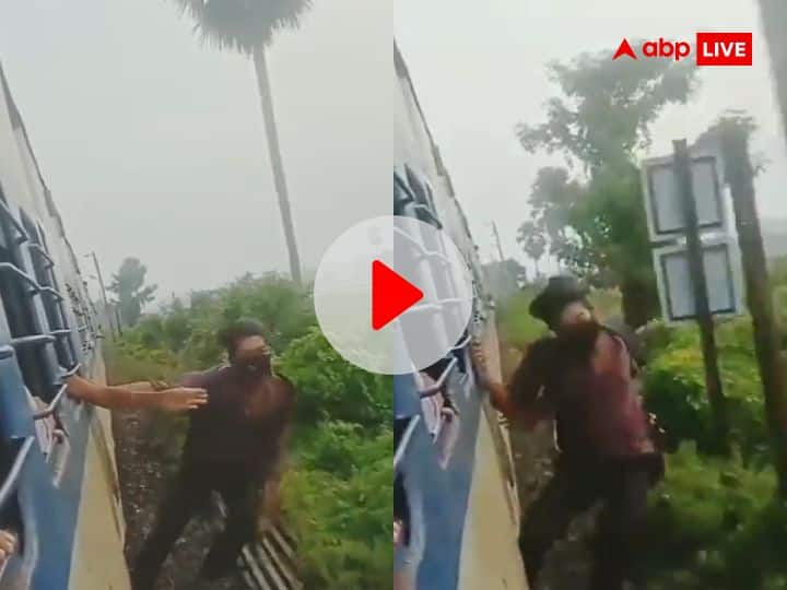 Viral Video Man Doing Stunt On Moving Train Gate Risked His Life तेज रफ्तार में दौड़ती ट्रेन पर लटक गया शख्स, किया खौफनाक स्टंट! जिसने वीडियो देखा वो ही हैरान