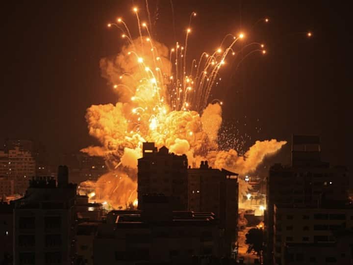 A missile explodes in Gaza City during an Israeli air strike on October 8, 2023. (Photo: Getty)