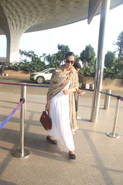 Sonam Kapoor Spotted At Airport In White Anarkali Suit, Beige Shawl And Rs 9 Lakh Hermes Bag - See Pics