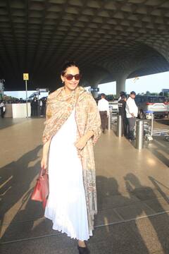 Sonam Kapoor Spotted At Airport In White Anarkali Suit, Beige Shawl And Rs 9 Lakh Hermes Bag - See Pics