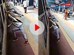 तेज रफ्तार से भागती ट्रेन में दो युवकों ने किया खौफनाक स्टंट, VIDEO वायरल होने के बाद यूजर्स ने लगाई लताड़