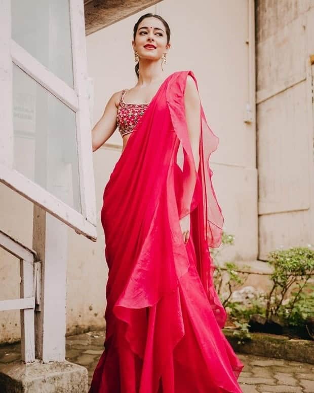 Ananya Pandey looked stunning in a pink ruffle saree with an embroidered blouse. Her choice of attire showcased her youthful style, making her a fashion inspiration for elegant yet trendy looks. (Image Source: PR Handout)