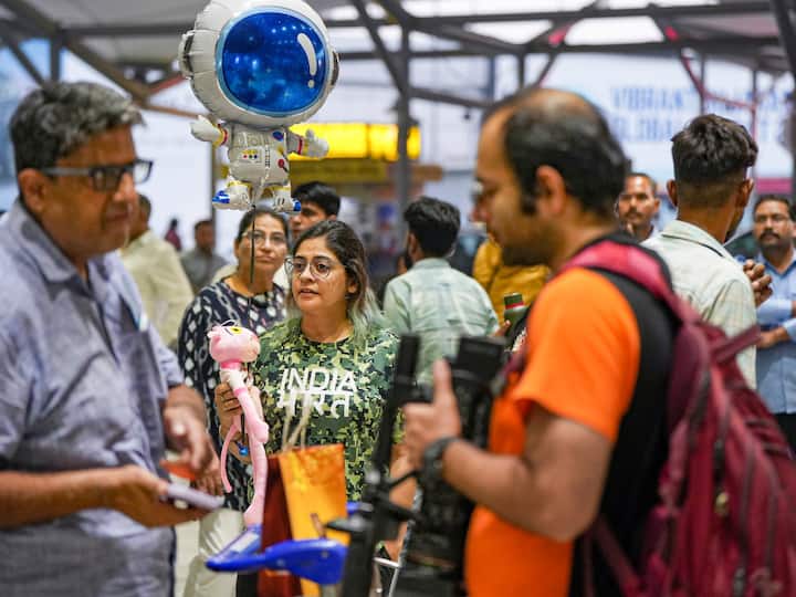 Families of Indian nationals evacuated from Israel under Operation Ajay wait at Indira Gandhi International Airport in New Delhi. (Image Source: PTI)