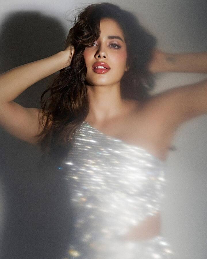 Janhvi Kapoor’s head-to-toe crystal-encrusted one shoulder gown had a thigh high slit and a cut out at the waist.