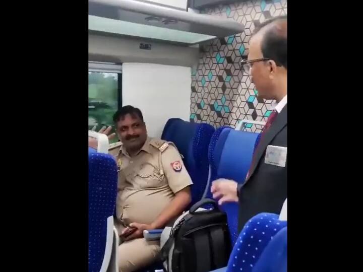 Policeman travels in Vande Bharat without ticket, engages in verbal spat with TTE watch video Watch Video: வந்தே பாரத் ரயிலில் டிக்கெட் இல்லாமல் பயணித்த போலீஸ் அதிகாரி! உங்களுக்கு ஒரு சட்டமா சார்?