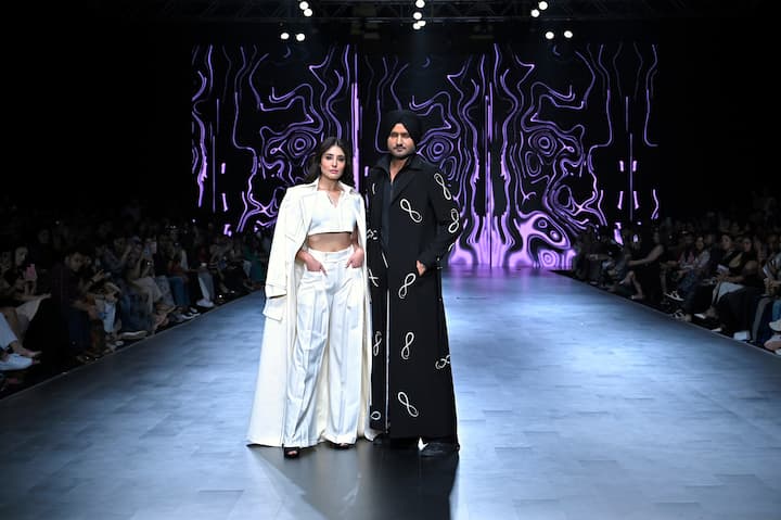 Opening the show was the very, flamboyant, dapper Harbhajan Singh who strutted his style in an all-black trio, comprising cropped, zippered jacket, trousers and floor skimming coat with the infinity symbol print. The show came to an end with the very, stylish Kritika Kamra, as she took the ramp in an all-white trio of cropped top, relaxed parallel pants and a flooring-kissing trench coat with giant lapels. (Image Source: PR Handout)