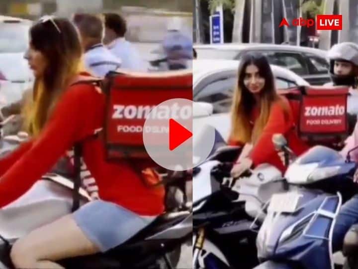Zomato Delivery Girl Ride Bike Without Helmet In Indore Madhya Pradesh Viral Video Zomato डिलीवरी गर्ल ने बिना हेलमेट के बोल्ड अंदाज में चलाई बाइक, कंपनी पर भड़का लोगों का गुस्सा- VIDEO