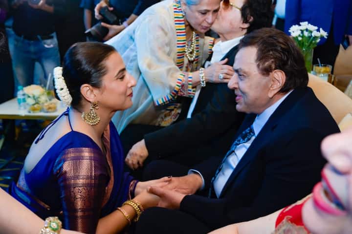 Vidya Balan in a conversation with Dharmendra.