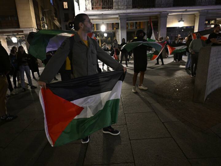 People gather in front of the Ministry of Foreign Affairs building to protest against Israeli airstrike on Al-Ahli Baptist Hospital in Gaza on Tuesday as Israeli attacks continue, in Madrid, Spain on October 17, 2023. (Photo: Getty)