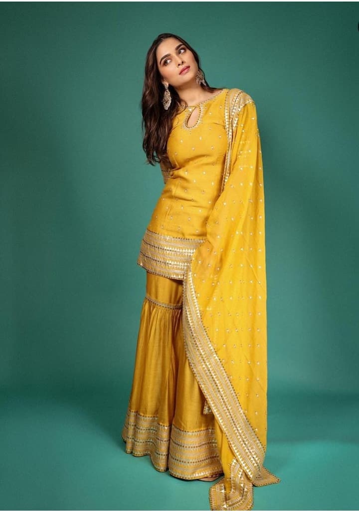 From sarees to lehengas or suits, yellow is a colour that radiates positivity and glamour in any outfit, (Image Source: PR Handout)
