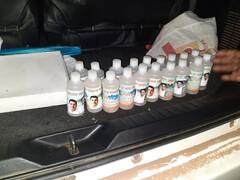 चुनाव में 'गंगाजल' के सहारे कांग्रेस? कमलनाथ और मुकेश नायक की फोटो वाली कई बोतलें जब्त