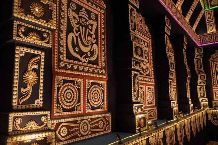 Goddess Durga's depiction in itself is the explanation of how humans should act in their lives in every situation. The presence of 10 globes in her hands teaches us the way of life where it represents that the World is One - 