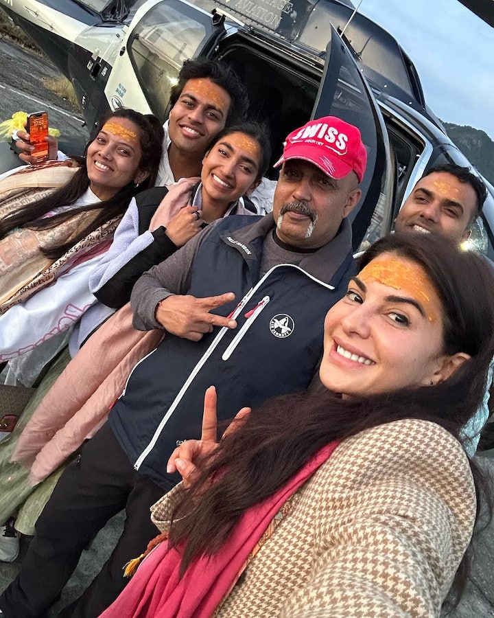 The picture shows the temple, her team members, and some solo pictures of the actress. She is also seen enjoying snowfall in one photo.