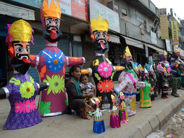 Effigies of Hindu demon King 'Ravana' at a street stall to be sold ahead of the 'Dussehra' festival, in Amritsar. Image Source: PTI