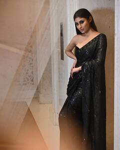 Mouni Roy Opts For A Glam Festive Look In A Black Saree And Off-Shoulder Blouse; PICS