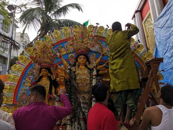 During this farewell event, people express their gratitude and heartfelt thanks to the deity, who has graced their homes and hearts for the past week. The immersion of the idol into the sacred river signifies the return of Goddess Durga to her celestial abode, leaving devotees with a sense of longing and anticipation for her return the following year. (Image Source: Utsa Ganguly)