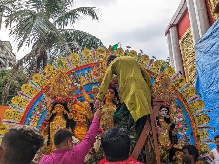 The enthusiasm and fervour with which the Goddess's arrival and departure are celebrated are a testament to the enduring power of tradition and devotion in the hearts of the Indian people. The cycle continues, and as the idol of Goddess Durga is lovingly adorned with garlands, devotees look forward to her triumphant return in the years to come. (Image Source: Utsa Ganguly)