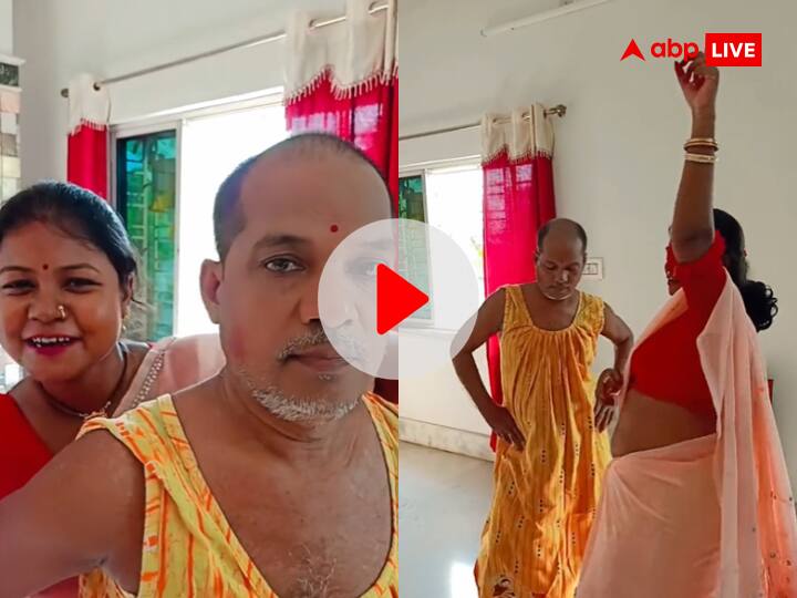 Weird News Hindi Woman Dolling Up Her Husband Like Bride Watch Viral Video रील बनाने के लिए महिला ने पति का किया औरतों की तरह श्रृंगार, फिर जमकर लगवाए ठुमके, वायरल हुआ VIDEO