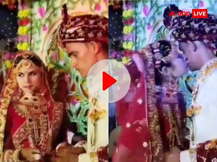 bride kissed the groom while jaimala watch couple viral video Bride Viral Video: वाह क्या सीन है! जयमाला करते हुए दुल्हन ने किया किस तो शर्म से लाल हुआ दूल्हा, देखें वीडियो