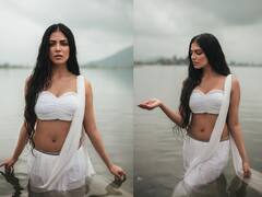 Malavika Mohanan Photos : குளத்தில் வெள்ளை தாமரையாய் மலர்ந்திருக்கும் நடிகை மாளவிகா மோகனன்!