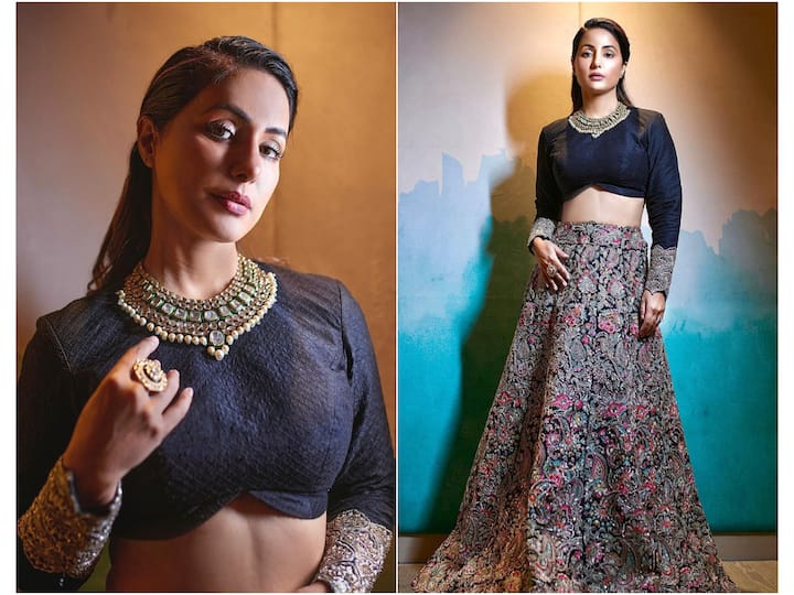 Hina Khan is looking gorgeous posing in a black crop top and multi-coloured embroidered lehenga.