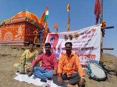 PHOTO : मराठा आरक्षणासाठी दिव्यांग तरुणाचे थेट कळसुबाई शिखरावर उपोषण