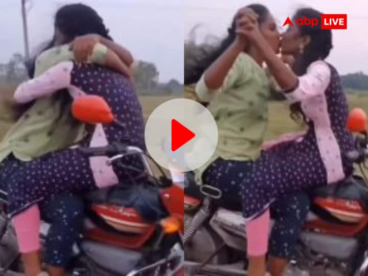 Girls kissing video went viral performed hugs and kisses stunt on bike watch video पहले हग फिर किस, तेज रफ्तार बाइक पर खतरनाक स्टंट करते दो लड़कियों का VIDEO VIRAL