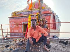 PHOTO : मराठा आरक्षणासाठी दिव्यांग तरुणाचे थेट कळसुबाई शिखरावर उपोषण