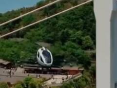 Chinese Air Taxi: ચીને કર્યો કમાલ, દુનિયાની પહેલી એર ટેક્સીને મળી ઓફિશિયલ માન્યતા, જુઓ તસવીરો....