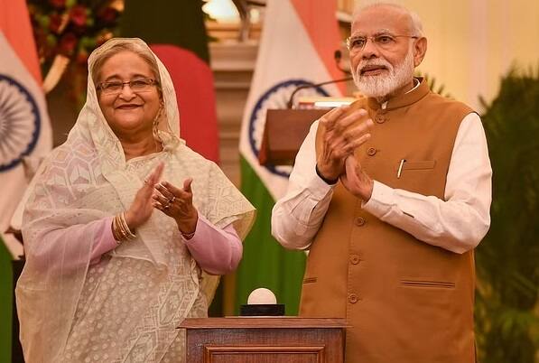 PM Modi, Bangladesh's Sheikh Hasina to jointly unveil three India-assisted projects today PM મોદી અને બાંગ્લાદેશના PM આજે ત્રણ વિકાસ પરિયોજનાઓનું કરશે ઉદ્ધાટન, ક્રોસ-બોર્ડર રેલવે લાઇન પણ સામેલ