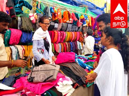 Villupuram news Sweaters sell wildly at roadside stalls in Villupuram TNN விழுப்புரத்தில் சாலையோர கடைகளில் ஸ்வெட்டர் அமோகமாக விற்பனை