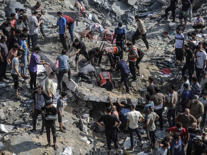 Teams conduct a search and rescue operation after the second bombardment of the Israeli army in the last 24 hours at Jabalia refugee camp in Gaza City, Gaza on Wednesday. (Source: Getty)