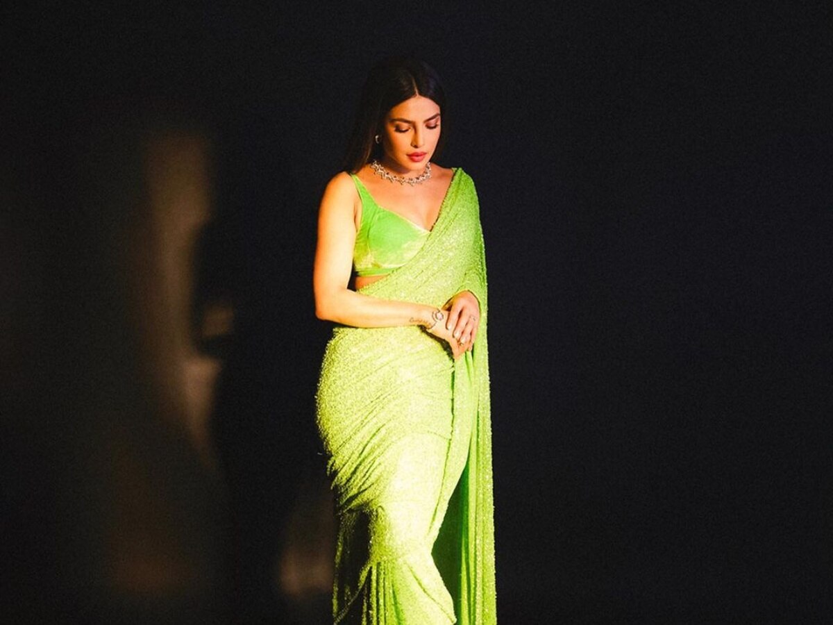 Priyanka Chopra looks effortlessly elegant in a pink chiffon saree