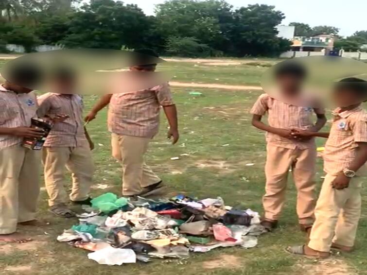 Mayiladuthurai news Sirkazhi public condemned school administration for disposing liquor bottles left by the drunkards in the school ground with the students TNN சீர்காழியில் மது பிரியர்களின் பாராக செயல்படும் பள்ளி விளையாட்டு மைதானம் - காலி மதுபாட்டில்களை அப்புறப்படுத்தும் பணியில் மாணவர்கள்