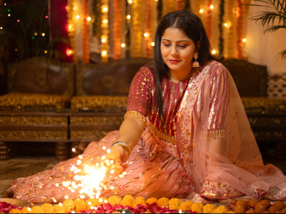 Young teenager girl celebrating diwali in Indian saree with diwali diya(oil  lamp). Diwali is biggest festival of India. Diwali is festival of lights  and happiness. Stock Photo | Adobe Stock