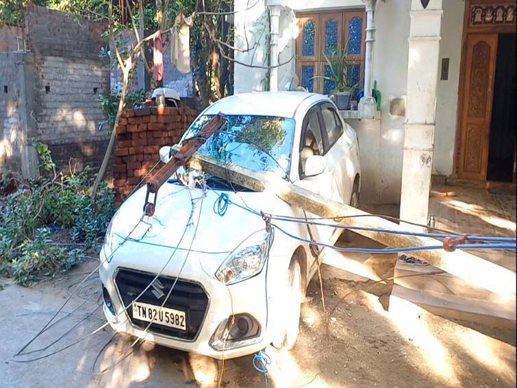 Mayiladuthurai news electric pole fell near Sirkazhi and damaged a luxury car TNN சீர்காழி அருகே மின்வாரிய அதிகாரிகள் அலட்சியத்தால் மின்கம்பம் முறிந்து விழுந்து சொகுசு கார் சேதம்