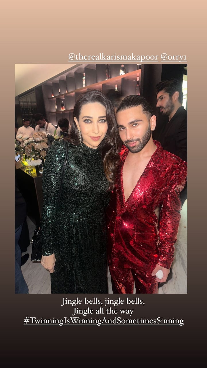 Orry striking a pose with Karisma Kapoor who looked gorgeous in an emerald green shimmery dress.