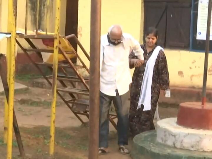 An elderly man leaves after casting his vote at a polling booth in Bhanpuri Assembly Constituency. (Source: ANI)