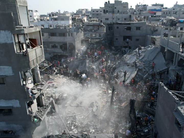 इजरायल हमास जंग: 11 हजार से ज्यादा मौतें, 15 लाख लोग विस्थापित, खंडहर में बदले गाजा के कई इलाके, समाधान अब भी नहीं | एक महीने की कहानी