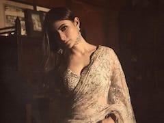 Mouni Roy Drapes Elegance In An Off White Saree At A Diwali Bash In Mumbai; See Pics